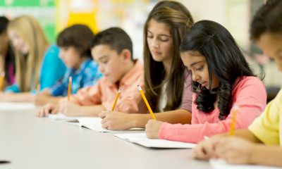 Elementary school students in their classroom.